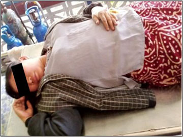 A woman injured in a terrorist attack on a passenger coach near Aye Kabar Village,  Thanbyuzayat Township of Mon State.
